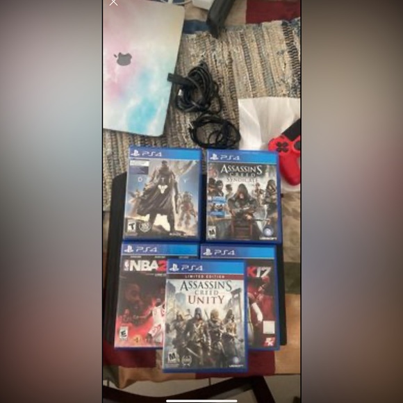 Selling ps4 pro with 5 games three controllers and box